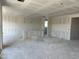 Unfinished living room featuring bare drywall walls, promising a custom design ready for personalization at 5510 W Paseo Way, Laveen, AZ 85339