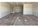 Wide-open living room with primed walls, with ample natural light, and neutral palette at 5510 W Paseo Way, Laveen, AZ 85339