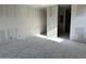 Bright living room with drywall ready for paint, offering a blank canvas for personalization at 5510 W Paseo Way, Laveen, AZ 85339