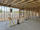Under-construction view of an open room, highlighting electrical work and exterior views at 5510 W Paseo Way, Laveen, AZ 85339