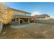 Large backyard with patio and grassy area at 728 E Payton St, San Tan Valley, AZ 85140
