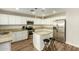 Kitchen boasts granite countertops and stainless steel appliances at 728 E Payton St, San Tan Valley, AZ 85140