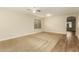 Bright living room with hardwood and carpeted floors at 728 E Payton St, San Tan Valley, AZ 85140