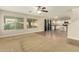 Open living room with hardwood floors and kitchen views at 728 E Payton St, San Tan Valley, AZ 85140
