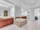Luxurious bathroom with granite vanity, soaking tub, and walk-in closet at 8 E Biltmore Est # 117, Phoenix, AZ 85016