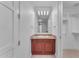 Elegant bathroom with granite vanity and walk-in closet at 8 E Biltmore Est # 117, Phoenix, AZ 85016