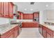 Modern kitchen with stainless steel appliances and granite countertops at 8 E Biltmore Est # 117, Phoenix, AZ 85016