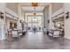 Elegant lobby with high ceilings and large windows at 8 E Biltmore Est # 117, Phoenix, AZ 85016