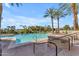 Inviting community pool with surrounding lounge area at 8 E Biltmore Est # 117, Phoenix, AZ 85016