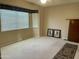 Bright bedroom with patterned curtains, neutral walls, and plenty of natural light at 839 Leisure World --, Mesa, AZ 85206