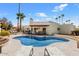 Inviting backyard oasis with sparkling pool, spa, and patio at 8466 E San Benito Dr, Scottsdale, AZ 85258