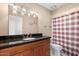 Simple bathroom with a shower/tub combo and granite countertop at 8466 E San Benito Dr, Scottsdale, AZ 85258
