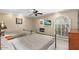 Guest bedroom with two twin beds and an arched window at 8466 E San Benito Dr, Scottsdale, AZ 85258