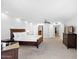 Spacious Primary bedroom with wood flooring and access to the bathroom at 8466 E San Benito Dr, Scottsdale, AZ 85258