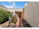 Welcoming entryway with tile path and mature desert plants at 8466 E San Benito Dr, Scottsdale, AZ 85258