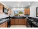 Well-equipped kitchen with modern appliances and ample counter space at 8466 E San Benito Dr, Scottsdale, AZ 85258