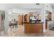 Bright kitchen features an island, ample cabinetry, and a breakfast nook at 8466 E San Benito Dr, Scottsdale, AZ 85258