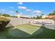 Private putting green situated beside the pool at 8466 E San Benito Dr, Scottsdale, AZ 85258