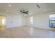 Large bedroom features recessed lighting, a ceiling fan, hardwood floors and three windows providing ample natural light at 8525 E Via De Los Libros --, Scottsdale, AZ 85258