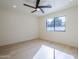 Bright bedroom with a ceiling fan and a window offering a view at 8525 E Via De Los Libros --, Scottsdale, AZ 85258