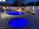Inviting backyard pool and spa featuring custom lighting and well maintained desert landscaping at 8525 E Via De Los Libros --, Scottsdale, AZ 85258