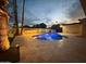 Gorgeous backyard pool and outdoor bar area, perfect for evening entertaining at 8525 E Via De Los Libros --, Scottsdale, AZ 85258