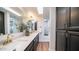 Elegant bathroom with double vanity and a view of a shower at 10841 N 9Th Pl, Phoenix, AZ 85020