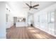 Living room with hardwood floors and kitchen view at 10841 N 9Th Pl, Phoenix, AZ 85020