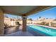 Covered patio overlooking a sparkling blue pool at 10841 N 9Th Pl, Phoenix, AZ 85020