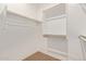 Large walk-in closet with double hanging rods and shelving at 12245 S 172Nd Ave, Goodyear, AZ 85338