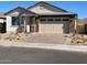 One-story house with a two-car garage and landscaping at 12245 S 172Nd Ave, Goodyear, AZ 85338