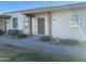 Front view of a single-story home with a well-maintained lawn and walkway at 13040 N 99Th Dr, Sun City, AZ 85351