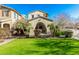 Two-story house with a manicured lawn and walkway at 13102 N 153Rd Ave, Surprise, AZ 85379