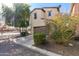 Attached garage with driveway and landscaping at 13102 N 153Rd Ave, Surprise, AZ 85379