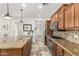 Well-equipped kitchen featuring granite counters and stainless steel appliances at 13102 N 153Rd Ave, Surprise, AZ 85379