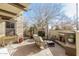 Private patio with seating area and fireplace at 13102 N 153Rd Ave, Surprise, AZ 85379