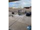 Relaxing backyard patio with a grill and seating area at 14533 N 147Th Dr, Surprise, AZ 85379