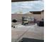 Cozy backyard patio with grill and comfortable seating at 14533 N 147Th Dr, Surprise, AZ 85379