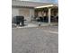 Spacious backyard with a covered patio and gravel area at 14533 N 147Th Dr, Surprise, AZ 85379