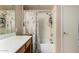 Bathroom with tub, shower, and wood vanity at 14533 N 147Th Dr, Surprise, AZ 85379