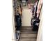 Large walk-in closet with ample storage space for clothes at 14533 N 147Th Dr, Surprise, AZ 85379