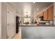 Modern kitchen with breakfast bar and ample cabinet space at 14533 N 147Th Dr, Surprise, AZ 85379
