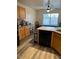 Well-equipped kitchen featuring wood cabinets and modern appliances at 14533 N 147Th Dr, Surprise, AZ 85379