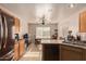 Inviting kitchen with stainless steel appliances and wood cabinets at 14533 N 147Th Dr, Surprise, AZ 85379