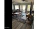 Spacious living room featuring hardwood floors and comfortable seating at 14533 N 147Th Dr, Surprise, AZ 85379
