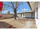 Large backyard with mature landscaping and covered patio area at 1521 E Del Rio Dr, Tempe, AZ 85282