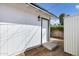 Backyard exterior showing side door and a serene outdoor space at 1521 E Del Rio Dr, Tempe, AZ 85282