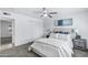 Cozy bedroom features neutral tones, ceiling fan, and closet at 1521 E Del Rio Dr, Tempe, AZ 85282