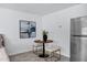 Living space featuring table with chairs and stainless refrigerator at 1521 E Del Rio Dr, Tempe, AZ 85282