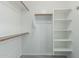 Bright walk-in closet with shelves and hanging rods at 1651 E Redwood Pl, Chandler, AZ 85286